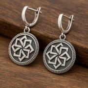 Серебряные серьги с сакральными символами