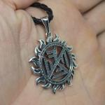 Славянский оберег символ Семаргла в солнце