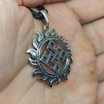 Славянский оберег Духовная сила в солнце из серебра