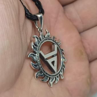 Славянский оберег символ Велеса в солнце из серебра