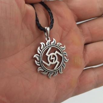 Славянский оберег Ведара в солнце из серебра